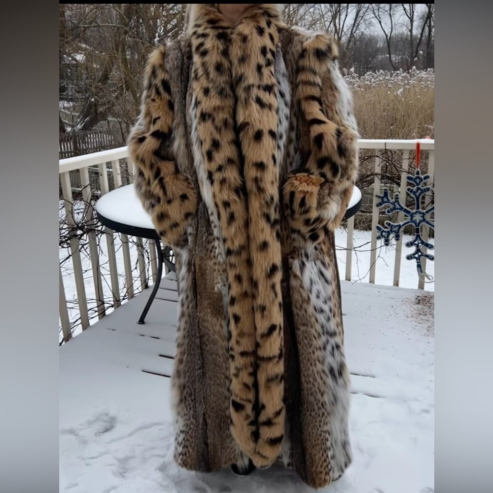 Luxurious Brown and Cream Full-Length Fur Coat.